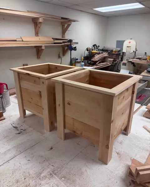 Pair of square cedar planters in the workshop